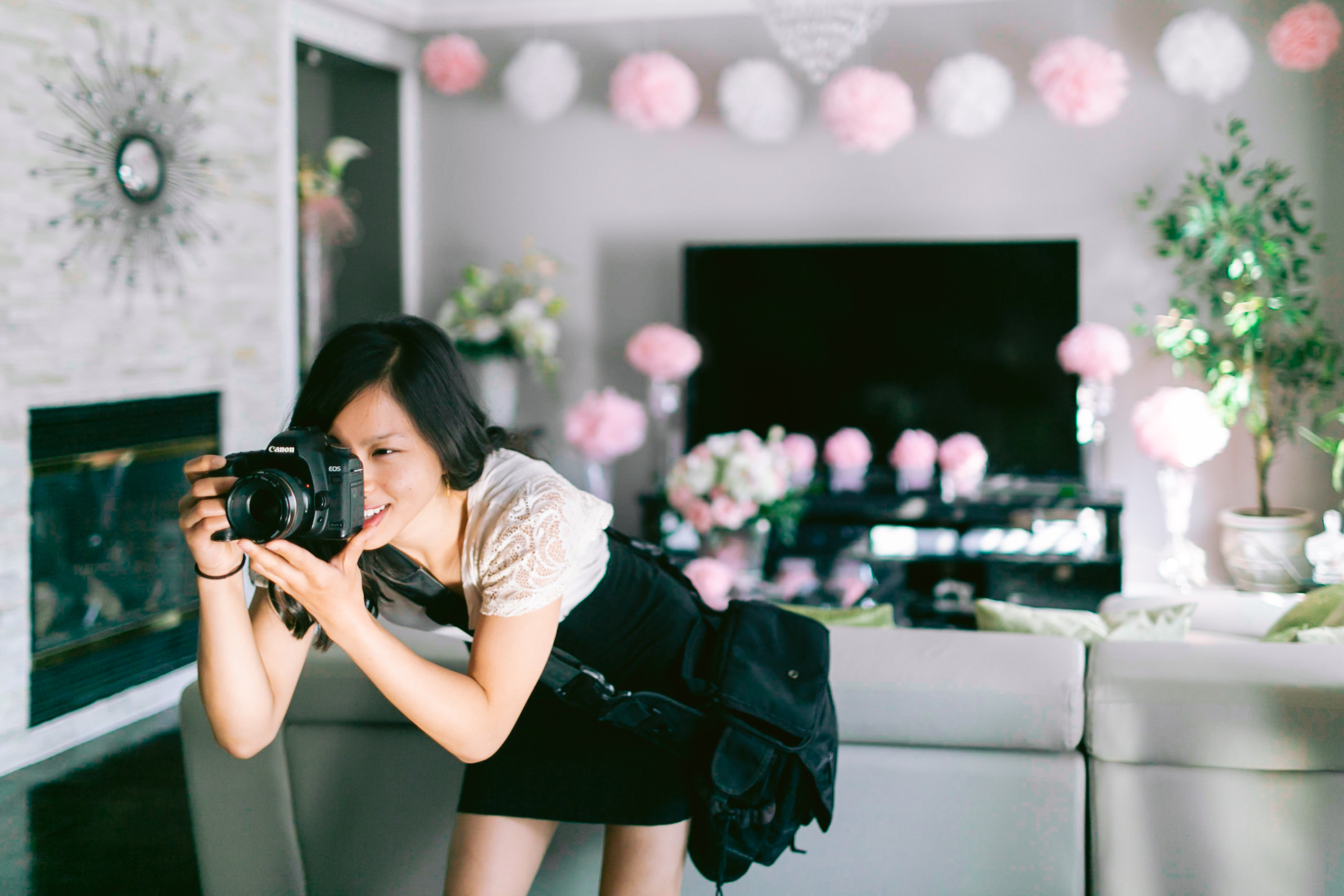 Behind-the-Scenes photo of Toronto wedding photographer, Jessica Hoang, capturing moments at a wedding.